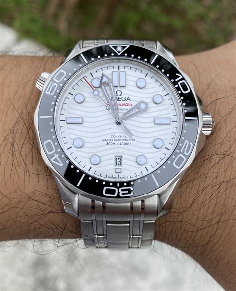 omega seamaster 300 white dial blue bezel|omega seamaster professional 300m quartz.